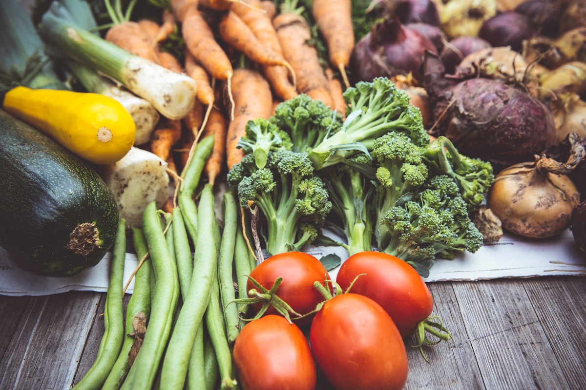 Colorful seasonal vegetables and fresh herbs